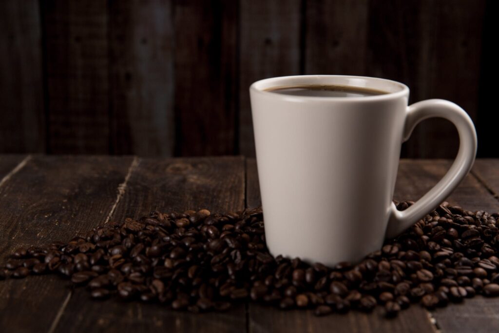 Coffee Mug Surrounded With Coffee Beans 4 6 coffee method
