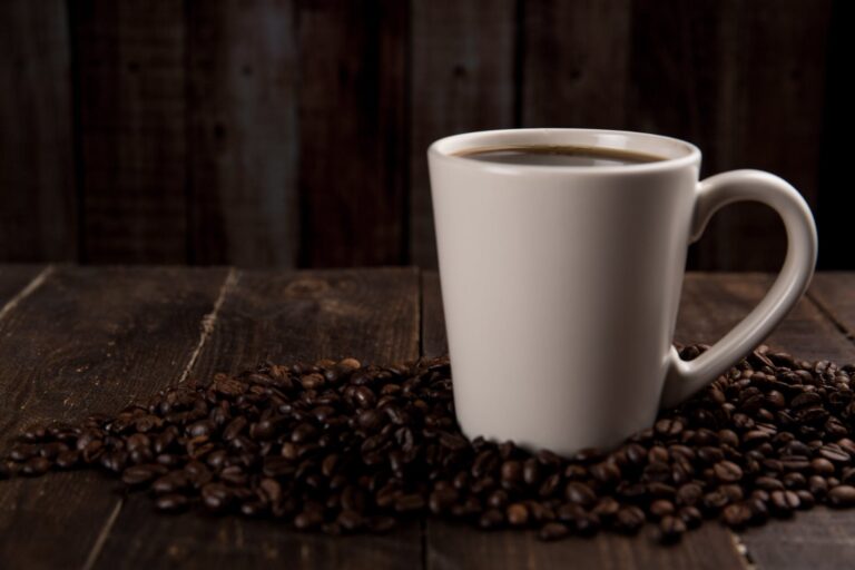 Coffee Mug Surrounded With Coffee Beans 4 6 coffee method