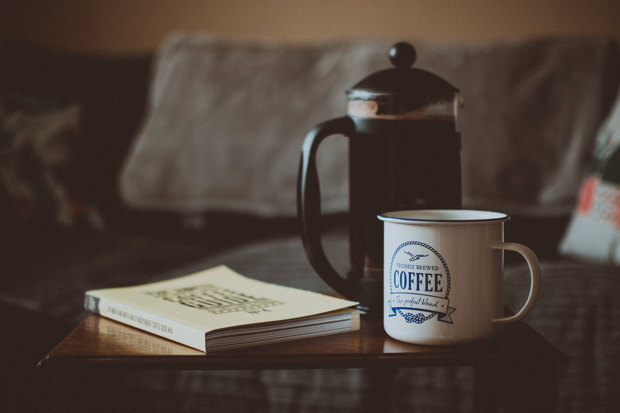 Closed Book Beside French Press and Mug - Make French Press Coffee Stronger